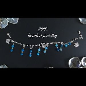 Butterflies and blue beaded bracelet .. silver